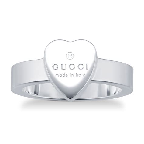 heart ring with gucci trademark on